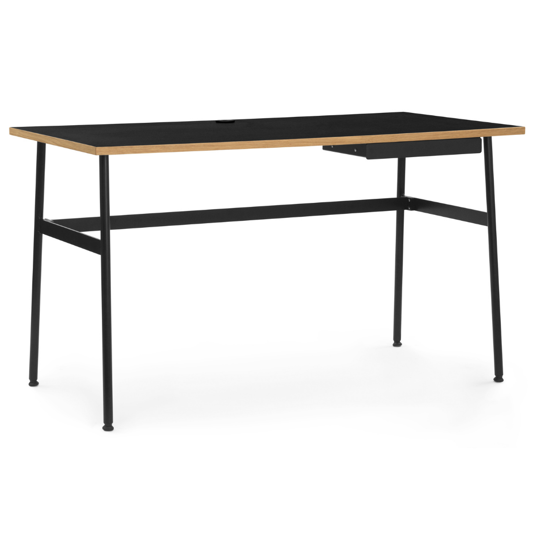 The Journal Desk by Normann Copenhagen celebrates simple and modern design that fits into any space throughout the home. This minimal desk offers all the essentials including a hole for power cords and a sleek steel drawer for daily-used office supplies.