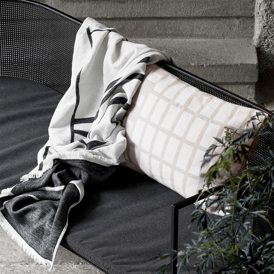 The Architecture Throw by Kristina Dam is a charming blanket made from organic cotton that you'll love adding to any space in your home. We love the modern and simple design, mimicking clean lines of city scapes.  We love it draped on the corner of a sitting chair, or at the edge of a stylish bench. This high quality piece is easy to care for, and is the perfect size for any occasion.