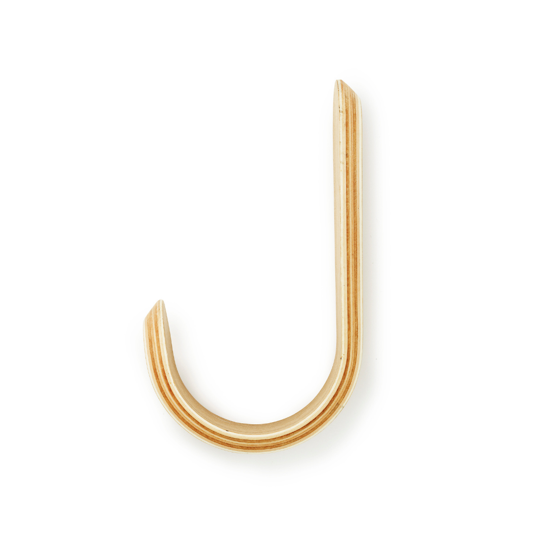 The Curve Hook by Normann Copenhagen was designed in collaboration with Danish designer Peter Johansen as a modern take on the classic hook often found in the entryway of the home.