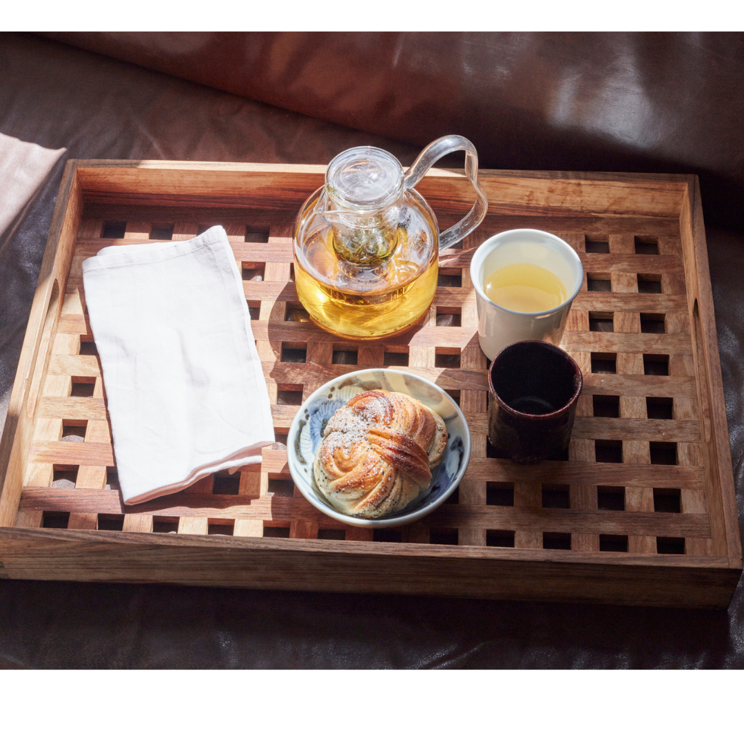 The Skagerak Fionia Tray is a modern, rectangular tray that can be used in a variety of spots throughout the home. We love it styled on a bed side table or bench at the base of a bed, but it can also be used when hosting guests outdoors or in the dining room. It's beautiful and simplistic, and will quickly become an item you use often.